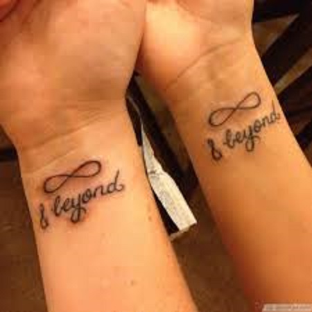 inifinty and beyond matching couple tattoo