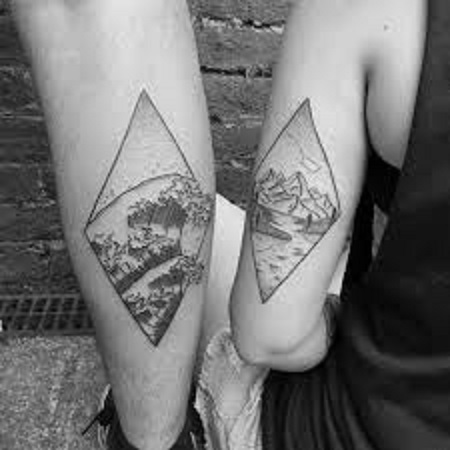 landscape matching couple tattoo