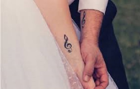 music matching couple tattoo