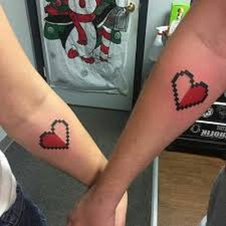 opposite hearts matching couple tattoo