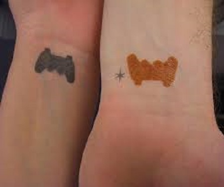 playstation matching couple tattoo