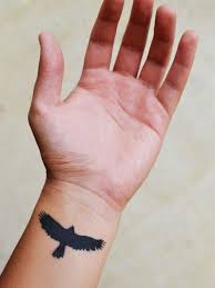 small bird tattoo for men