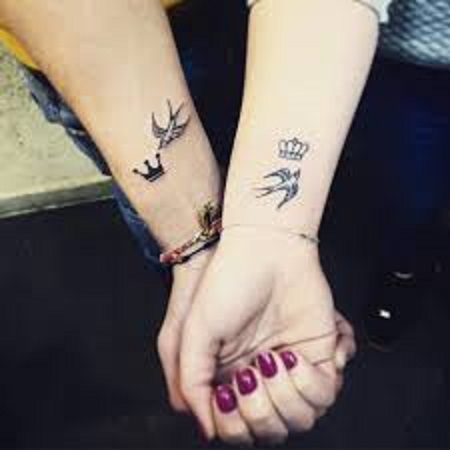small crowns matching couple tattoo