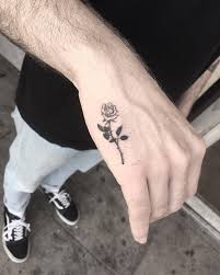 small flower tattoo for men