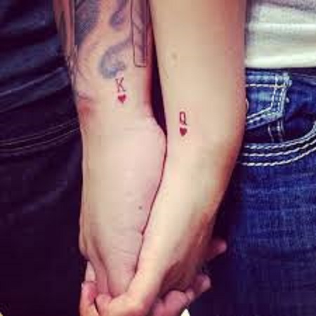 small hearts matching couple tattoo
