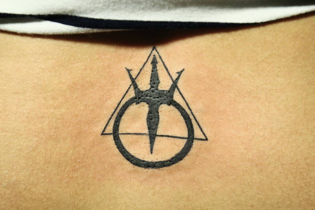 small trident tattoo for men