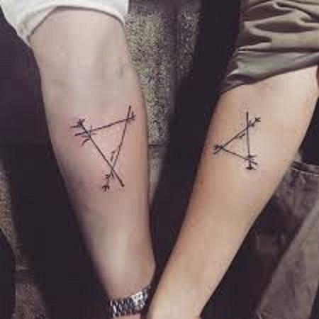 triangles matching couple tattoo
