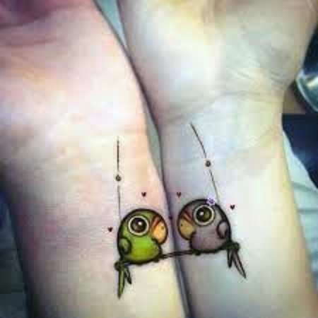 two birds matching couple tattoo