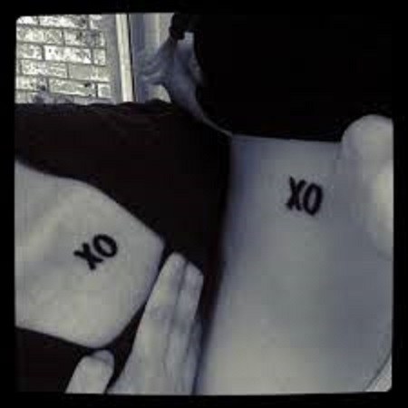 xo matching couple tattoo
