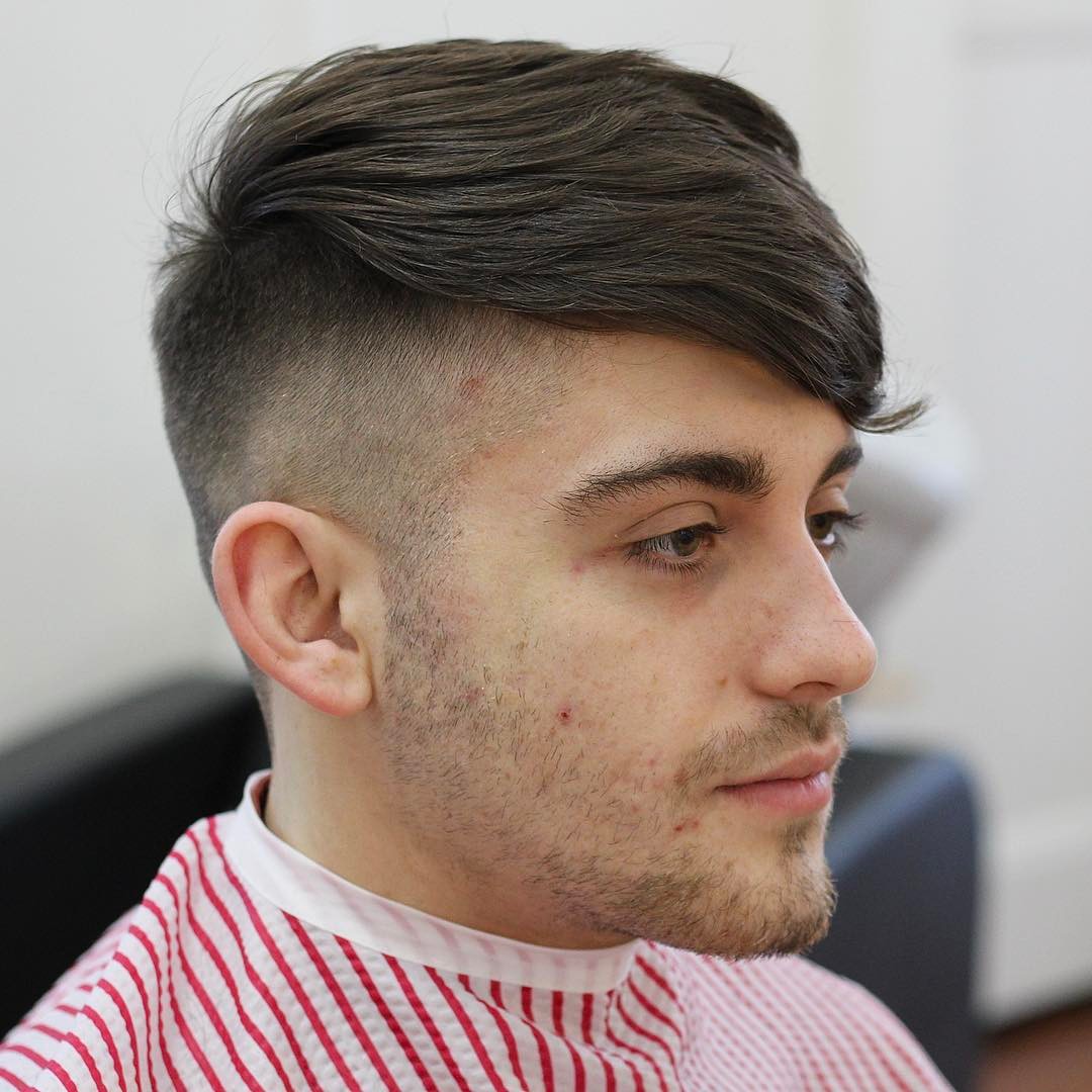 medium-length-haircuts-for-men-side-fringe-undercut-high-fade