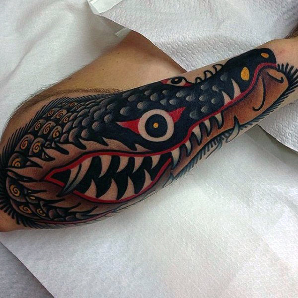 A Traditional Crocodile Along the Outer Forearm