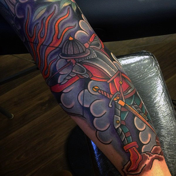 Add Extra Color with Blue and Orange in Your Forearm Traditional Tattoo