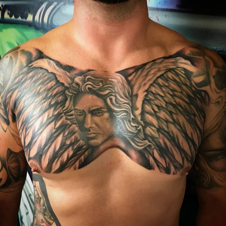 Angel Face Chest Tattoo