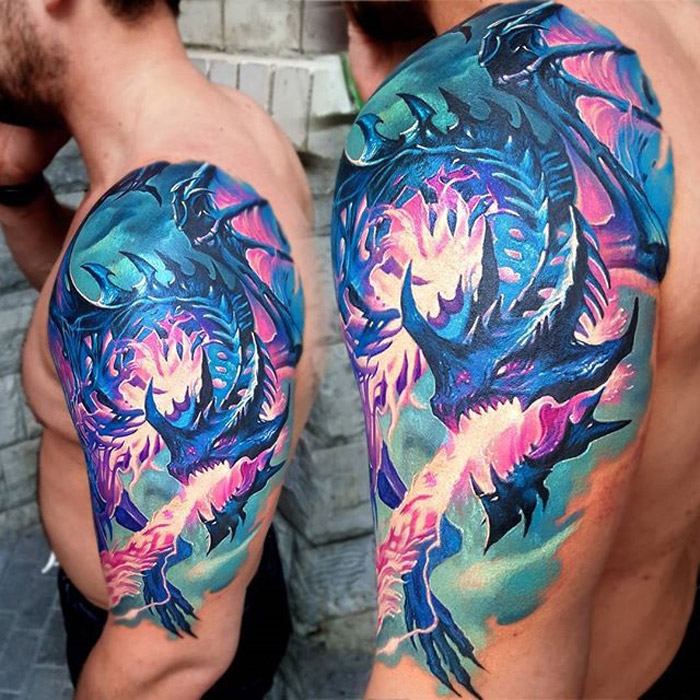 Blue, Pink, and Purple Fire-Breathing Dragon Tattoo
