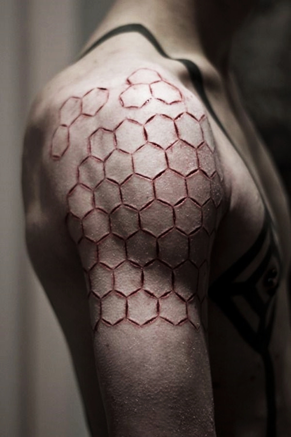 Honeycomb Shoulder Scarification Tattoo