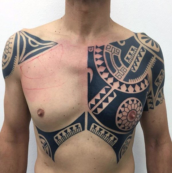 Shoulder Tattoo that Becomes a Chest Piece