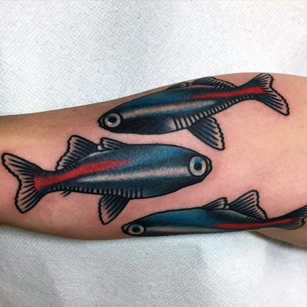 Three Identical Salmon Swimming along the Upper Arm