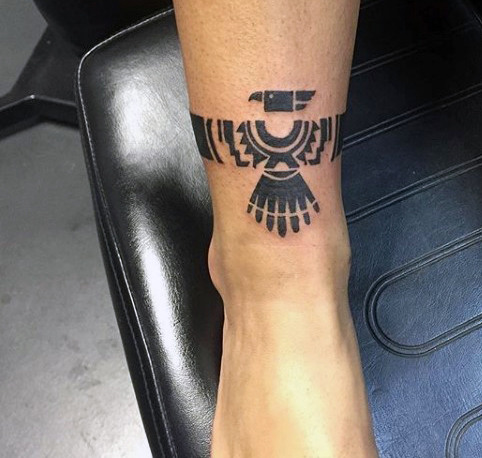 Ankle Tattoo of an Aztec Eagle