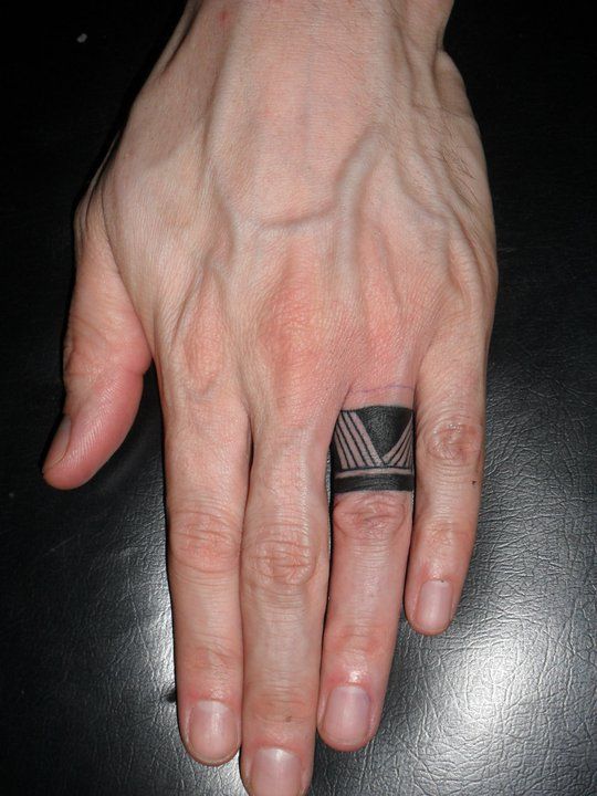 Aztec Symbol Ring Finger Tattoo