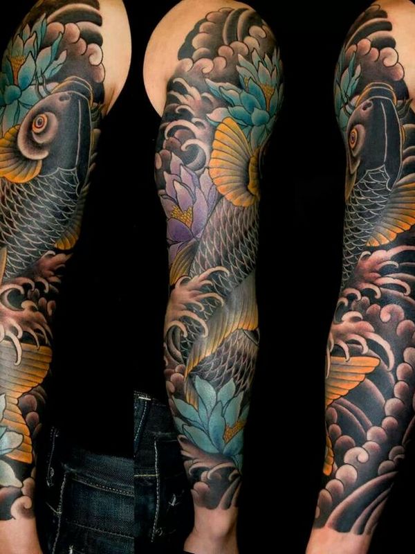 Black Koi Fish Tattoo with Hints of Blue, Purple, and Yellow
