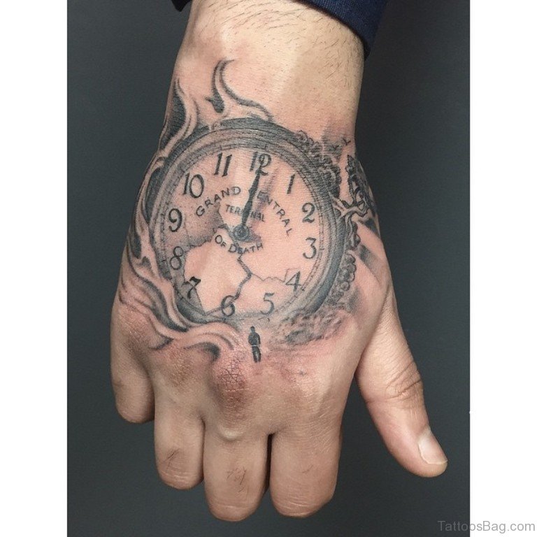 Clock on Fire Hand Tattoo