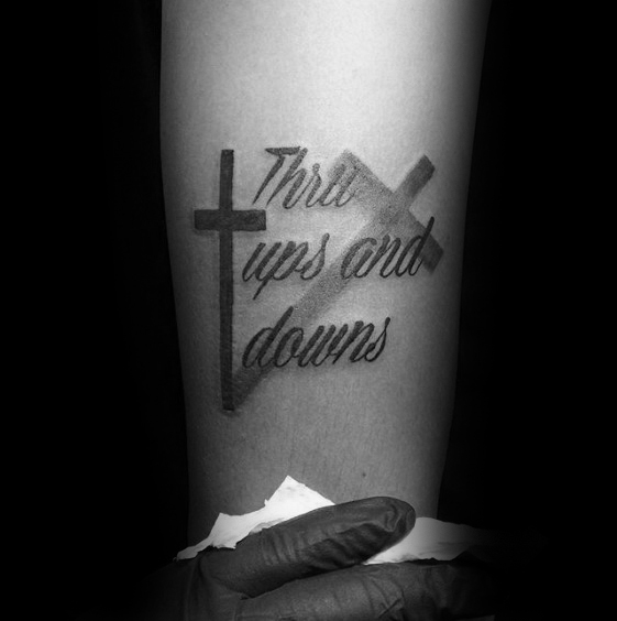 Forearm Tattoo of a Cross with a Shadow