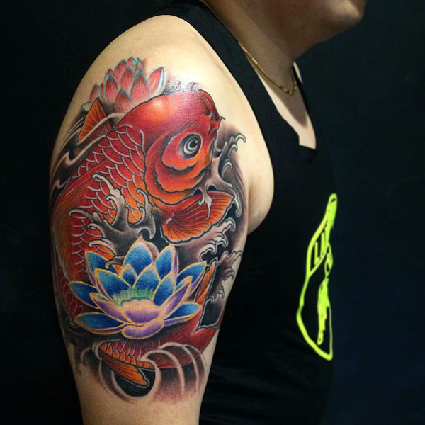 Koi Fish Shoulder Tattoo with a Lotus Flower