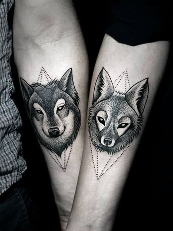 Matching Crystal and Wolf Tattoos