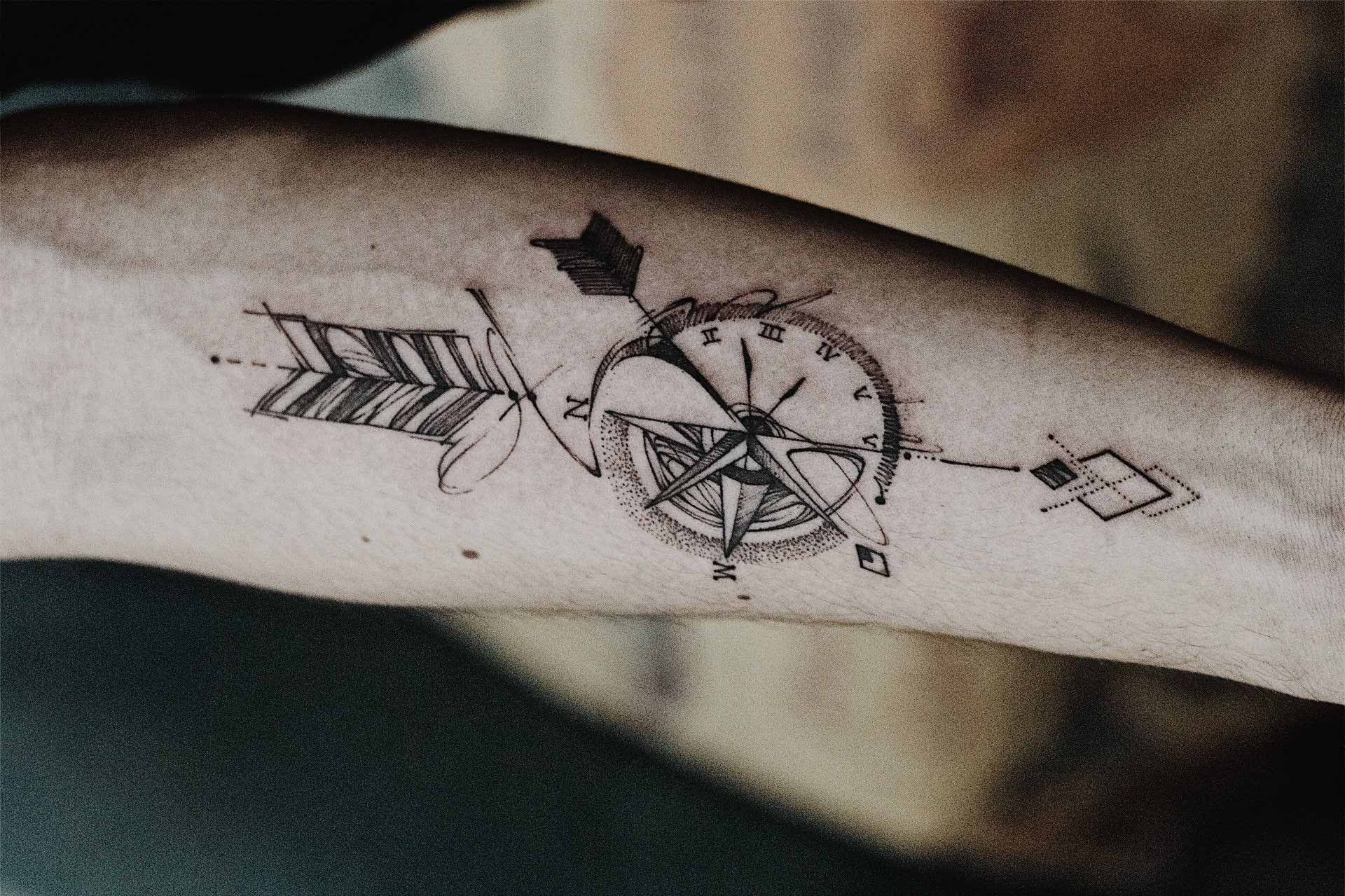 Minimalist Clock and Arrow Tattoo