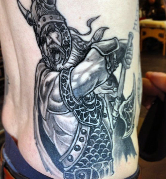 Nordic Warrior Mid-Fight Ribcage Tattoo