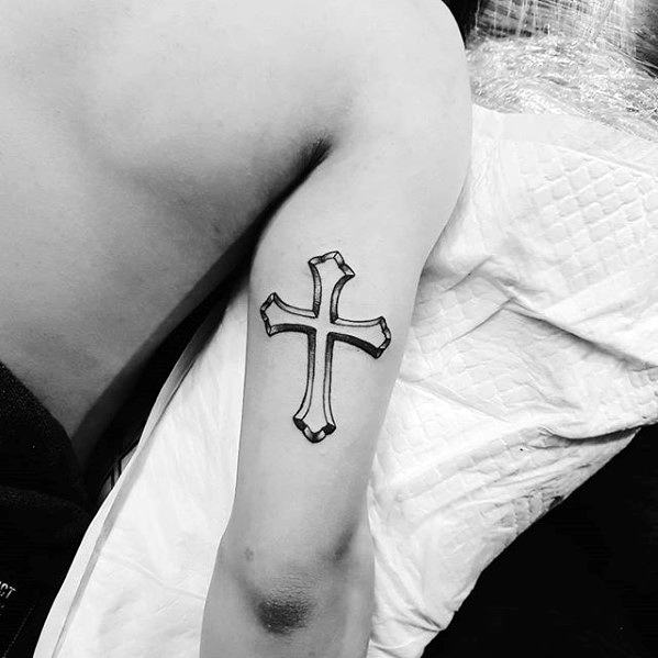Outline of a Cross Tattoo on Your Tricep