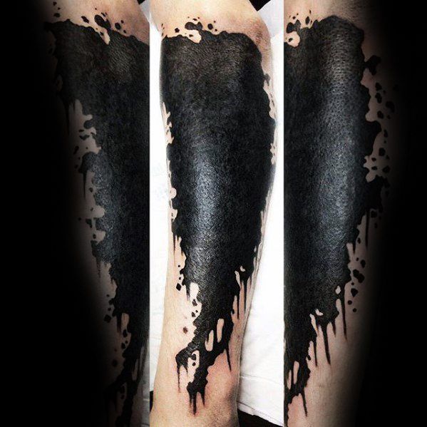Paint Splatter Arm Tattoo