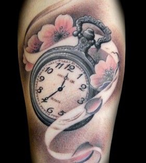Personal Clock Tattoo Surrounded by a Floral Design