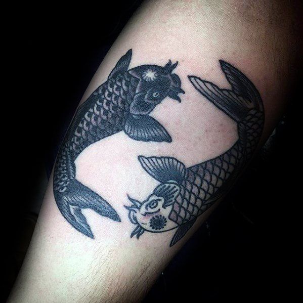 Tattoo of Two Black Koi Fish Circling Each Other