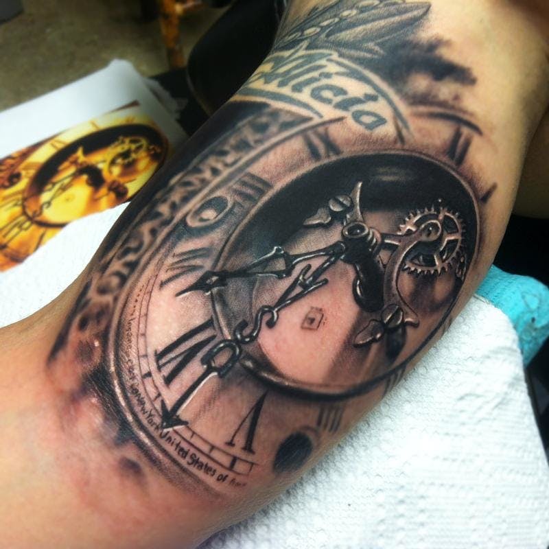 Tattoo of a Clock at an Angle