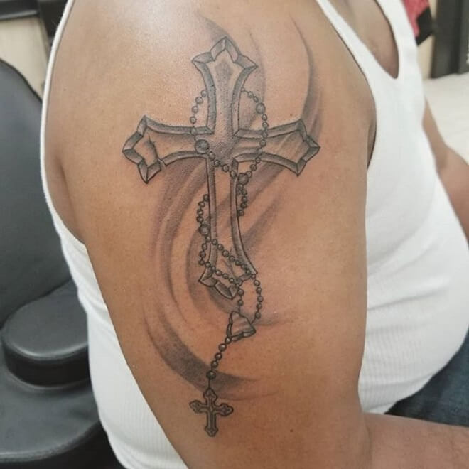 Tattoo of a Rosary Wrapped Around a Cross