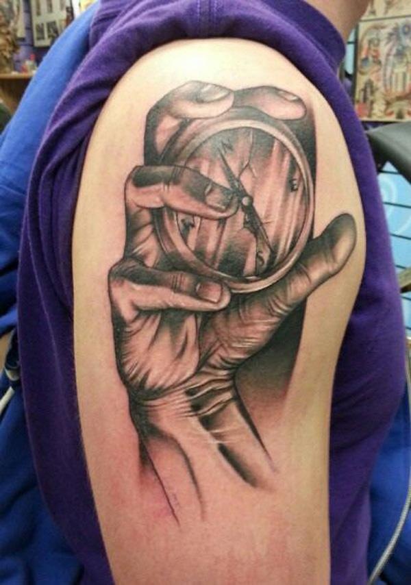 Tattoo of a Sketched Hand Gripping a Clock