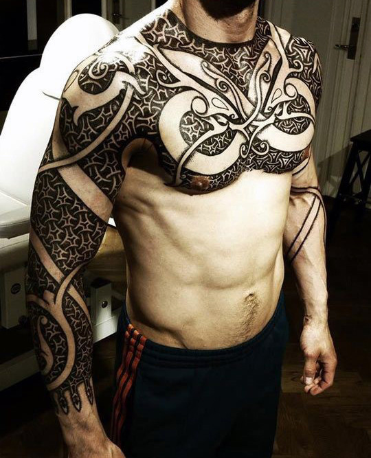 Upper Chest Nordic Tattoo Idea for Men