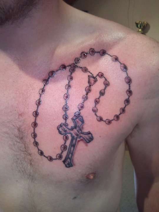 Coild Up Rosary Bead Chest Tattoo