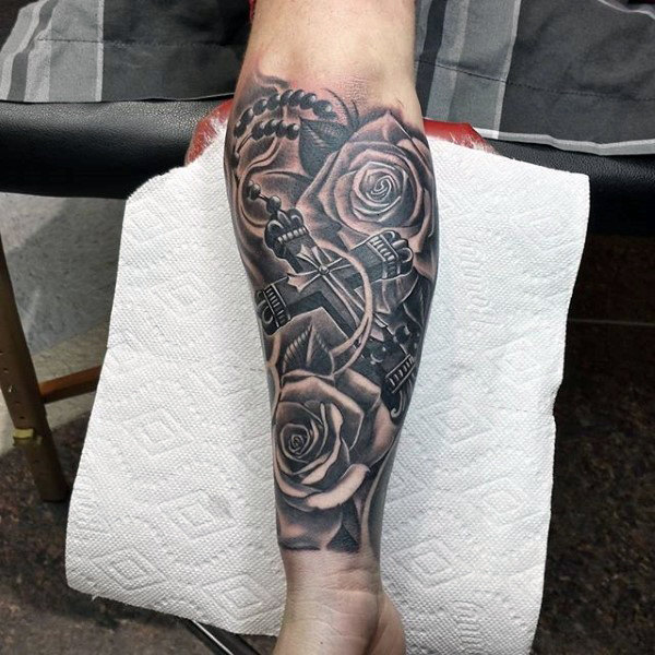 Forearm Rosary Tattoo that Blends in With Roses