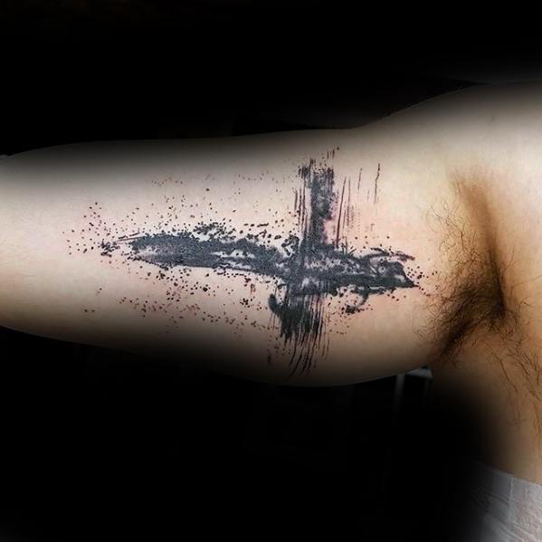 Inner Arm Splattered Ink Cross Tattoo