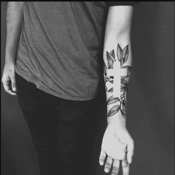 Negative Space Cross and Palm Leaves Forearm Tattoo