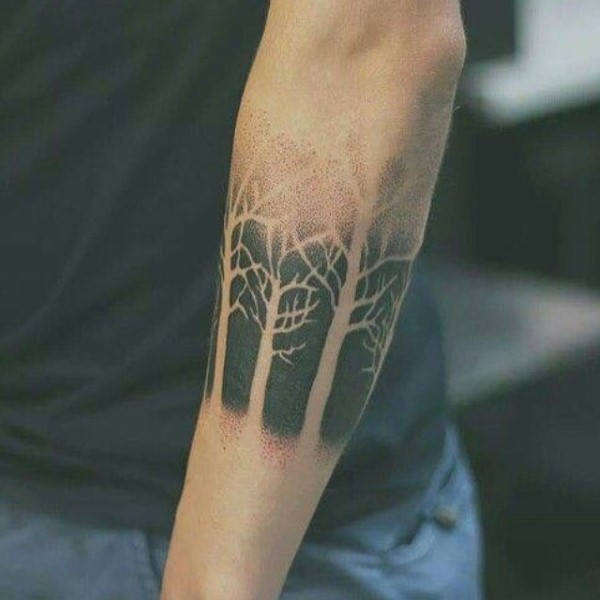 Negative Space Forearm Dark Forest Tattoo Design for Men