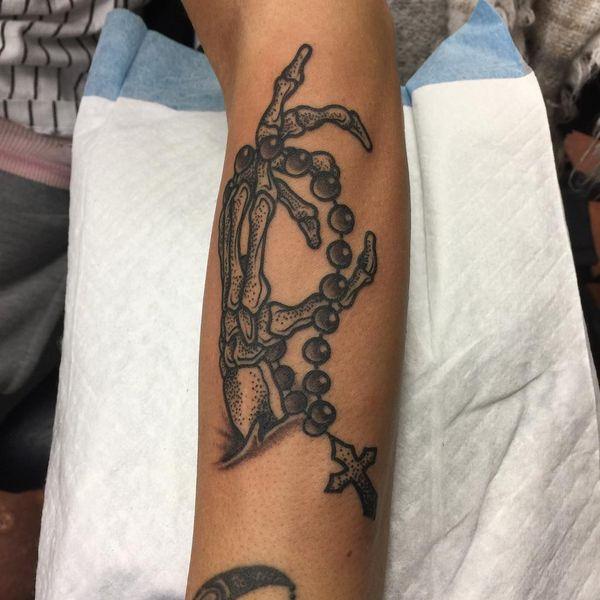 Neo Traditional Rosary Tattoo of a Skeleton