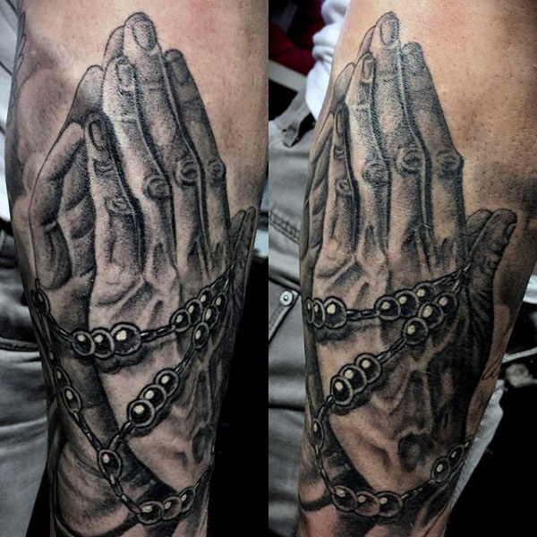 Prayer Hands Surrounded by a Rosary