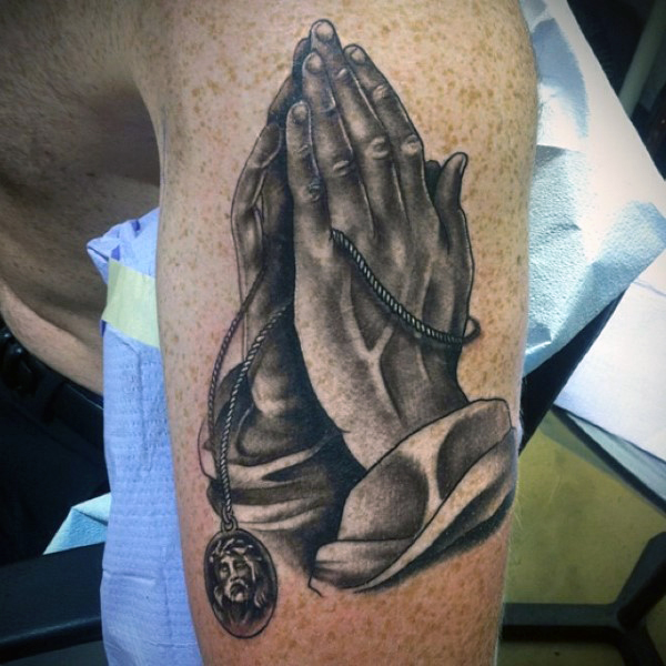 Praying Hands Holding a Rosary