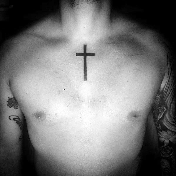 Simple Fine Lined Cross Chest Tattoo for Men