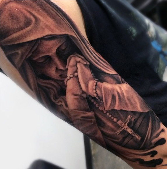 Tattoo of a Praying Woman Holding a Rosary
