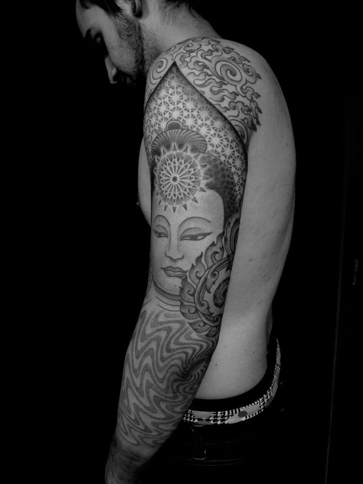 Very Detailed Full Sleeve Tattoo Incorporating the Buddha