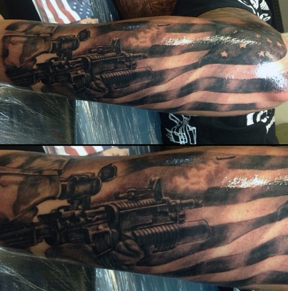 Back of the Leg Military Weaponry Tattoo Idea